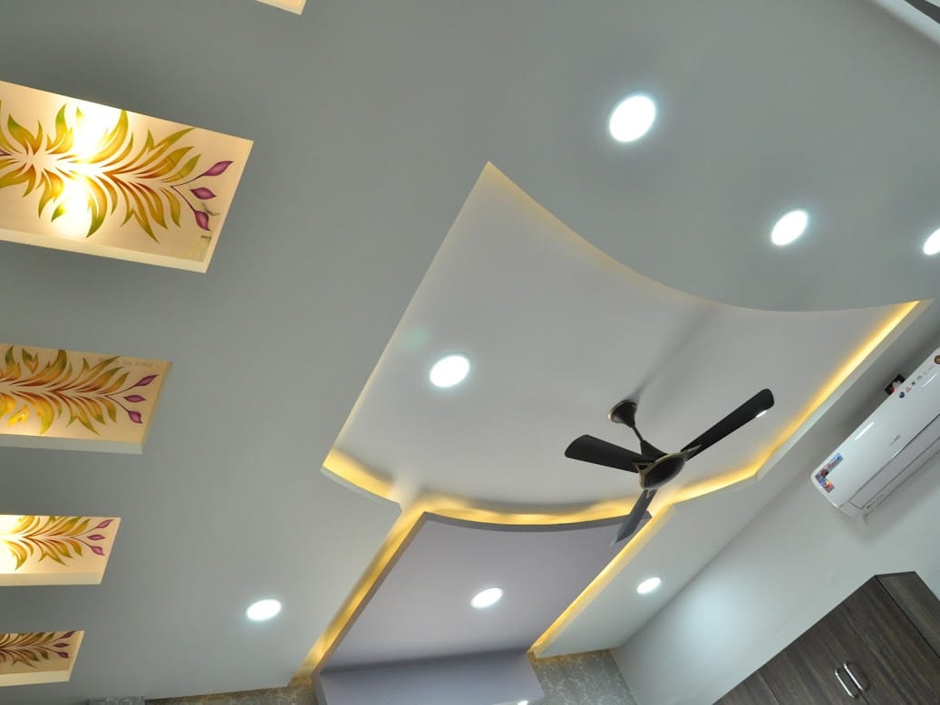 BSR Infra Office, Ballari — Curved false ceiling with cove lighting and hand-painted decorative light boxes