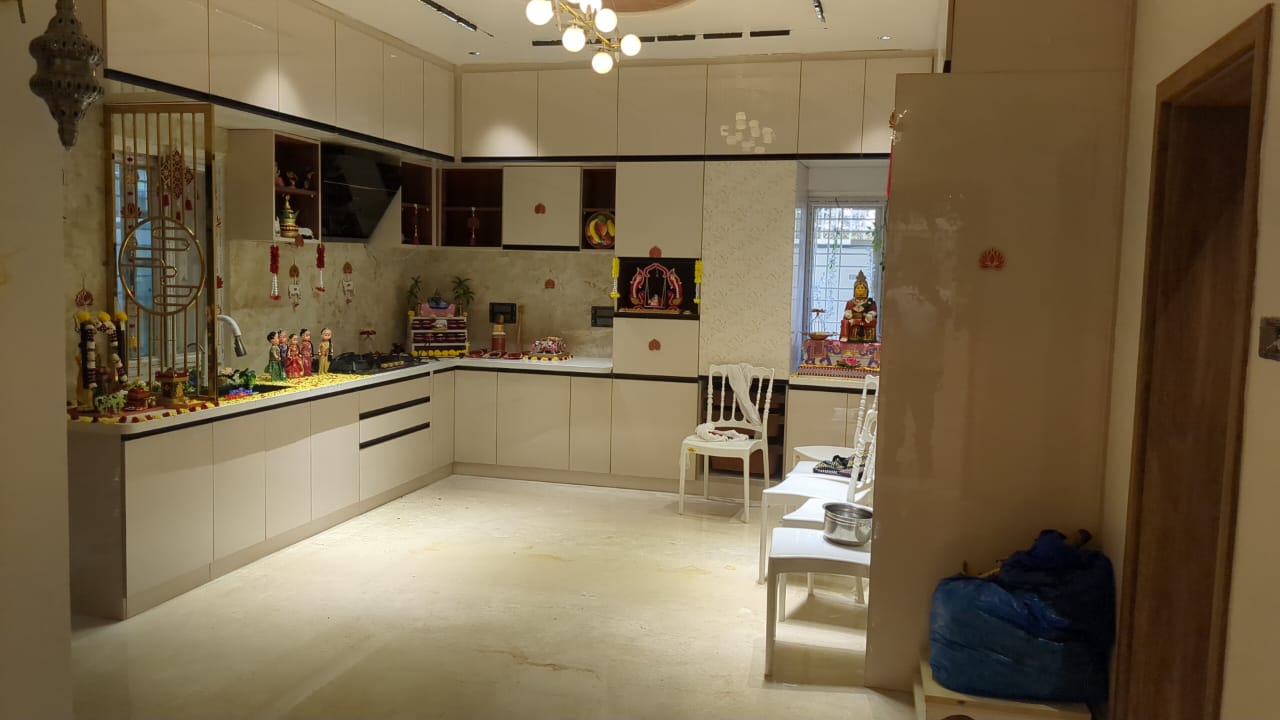 Ajay's House, Ballari — Open kitchen and dining view with integrated pooja space